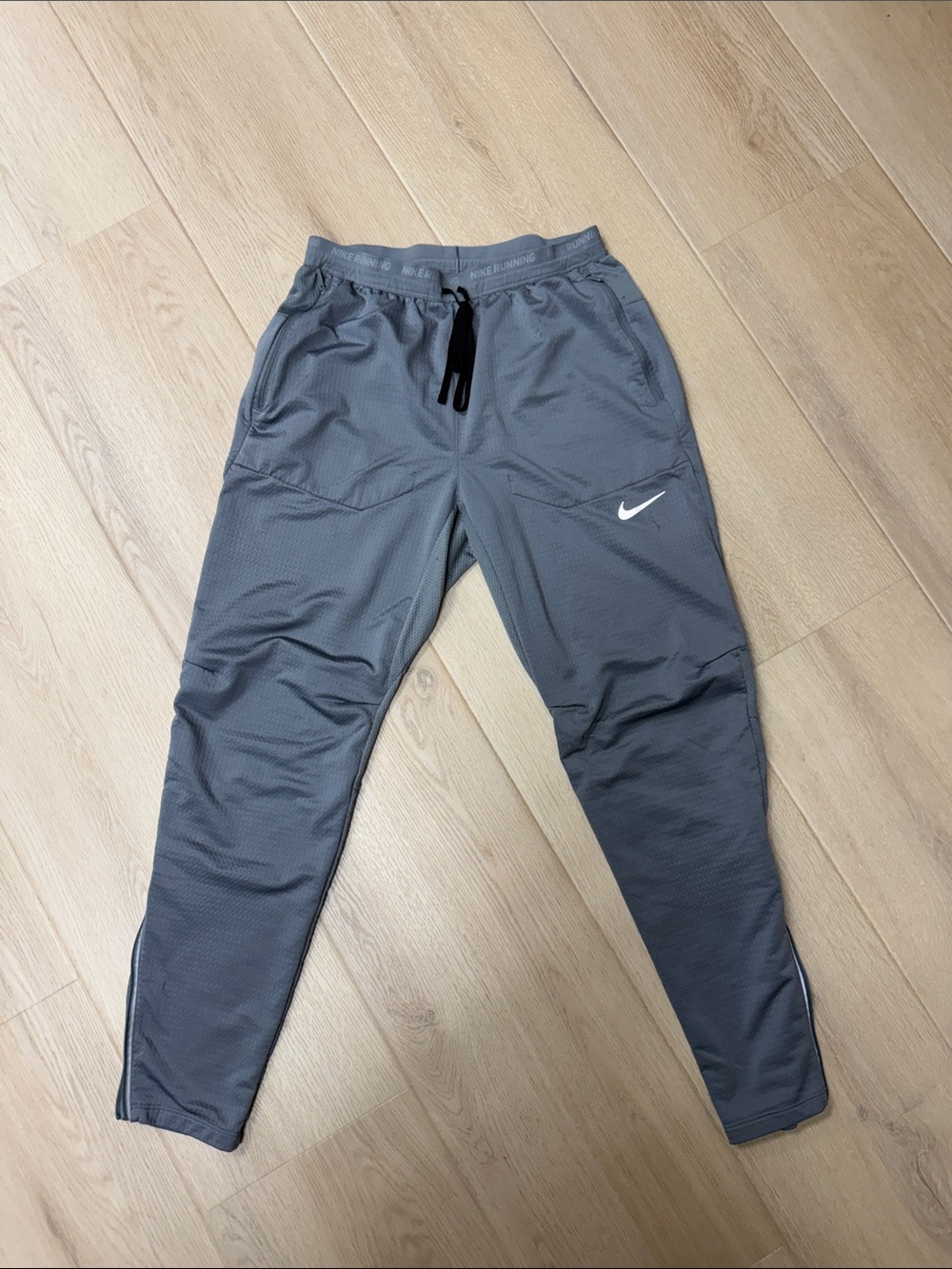 Nike Dark Gray Athletic Track Pants with White Swoosh